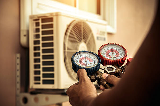 Professional Hvac technician working in Clanton, AL